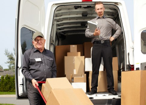 Man With Van Bankside team handling sorted recyclable moving boxes