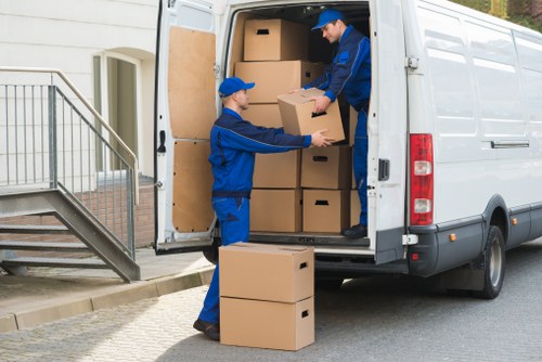 Packed office boxes and furniture prepared for a commercial move