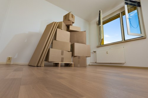 Removals team planning a move in Bankside near riverside buildings